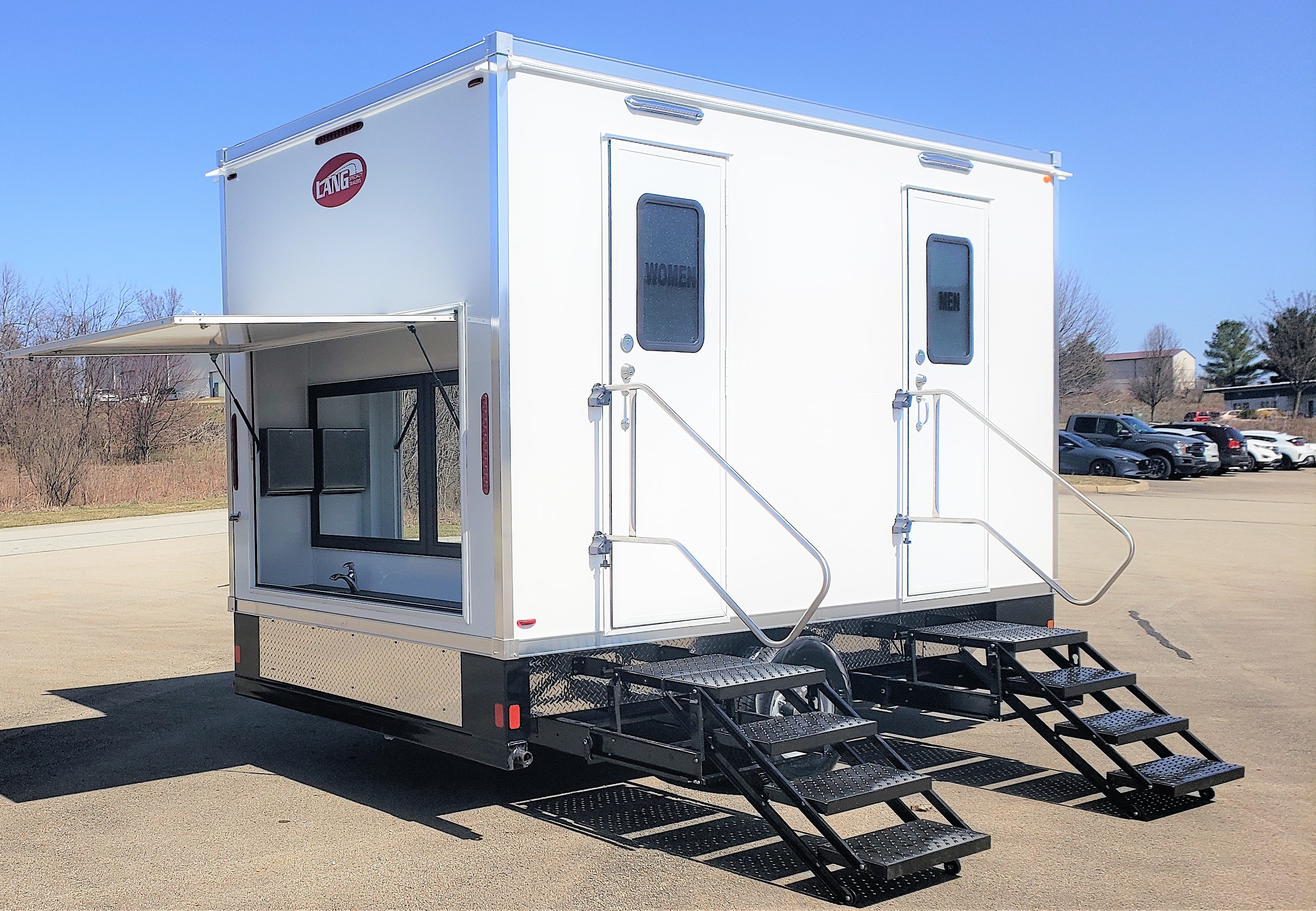 Homeless outreach restroom and shower trailers.